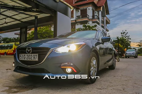 Mazda 3 Xanh Nang Cap Bi Xenon Mi Led Vong Angle 1.png